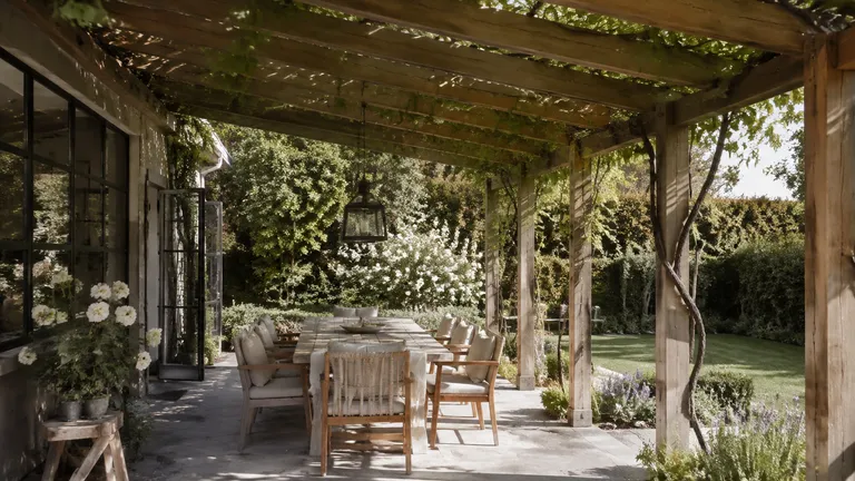 Timber pergola over a leafy Christchurch outdoor living area